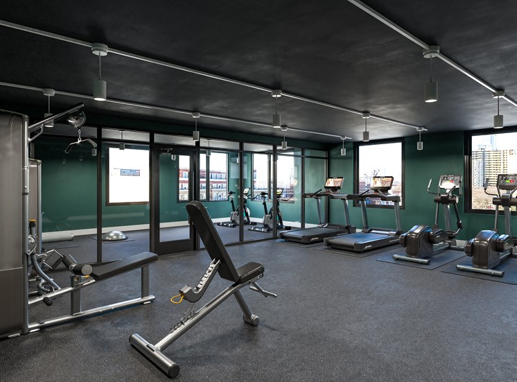 Apartment building on-site fitness center at 23rd Place at Southbridge apartments in Chicago, IL near